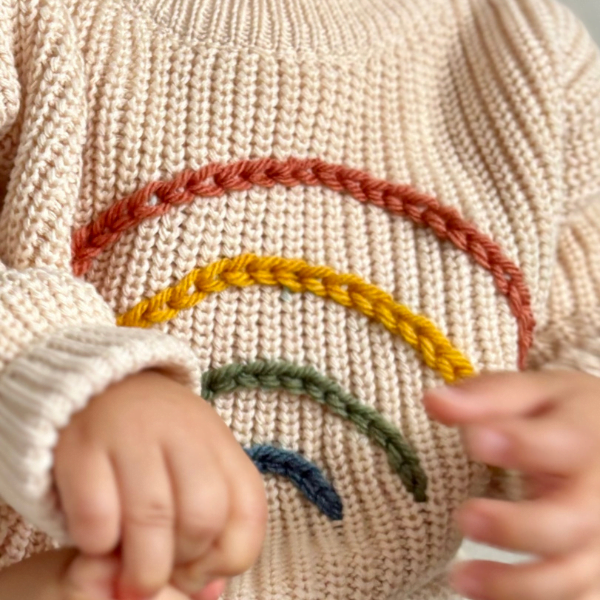 Raibow Jumper worn by toddler